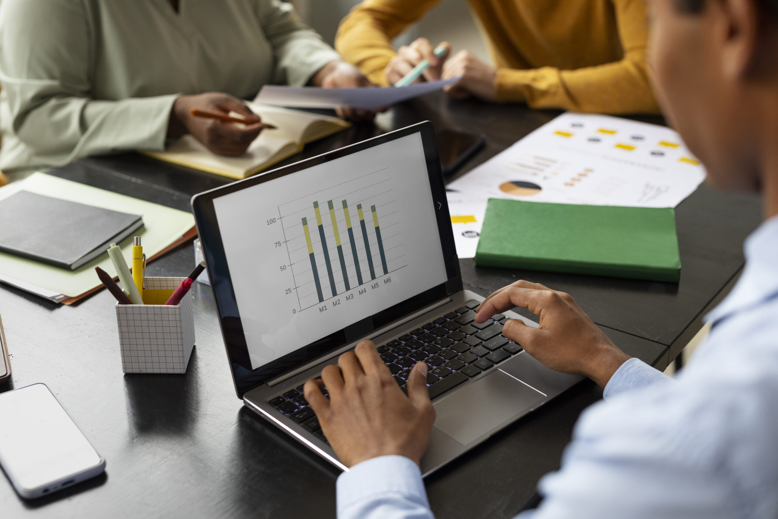 side view people working together